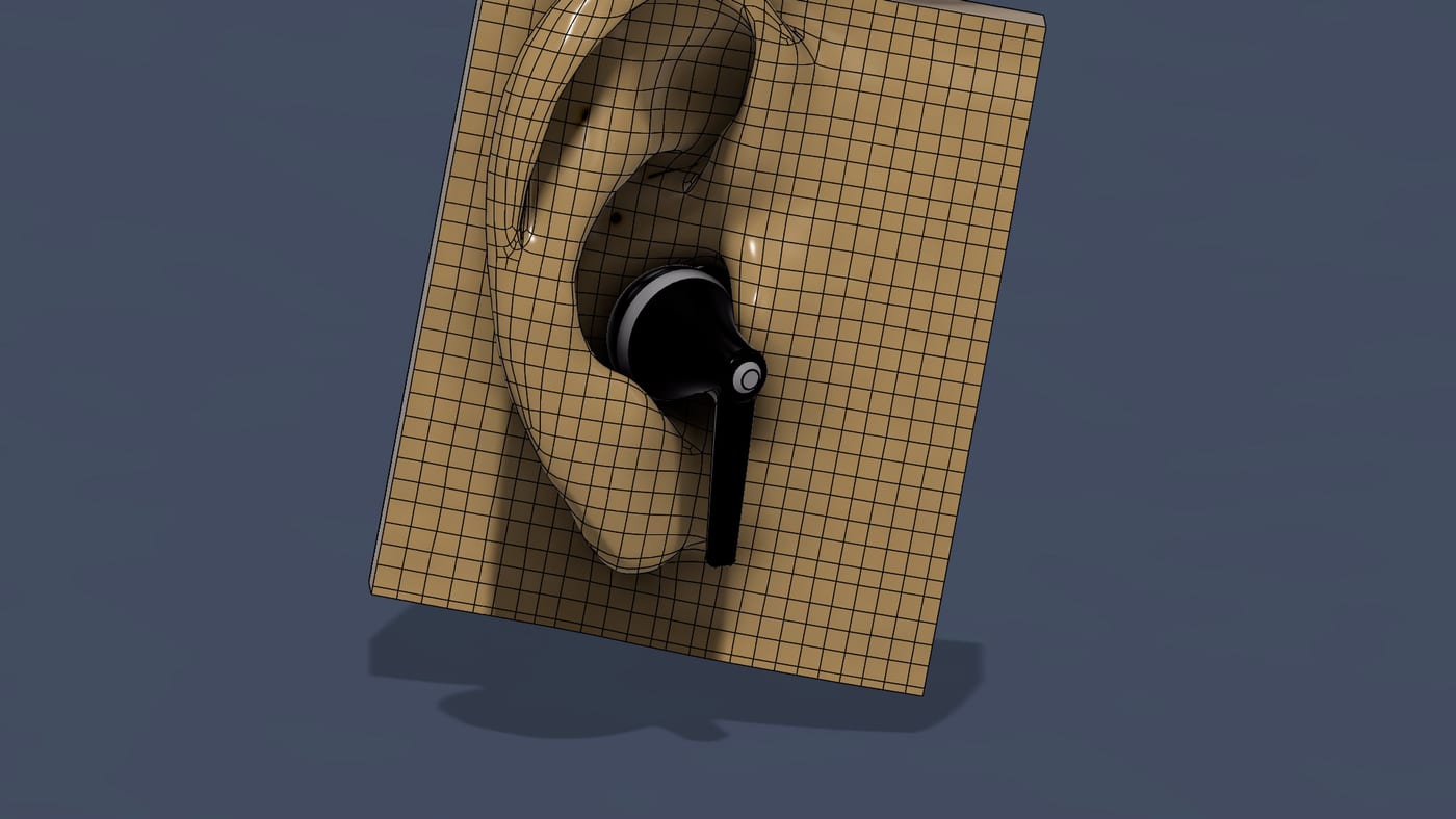 CAD render of the finished earbud seated in a 3D model of a human ear, showing how the in-ear EEG sensor fits the ear canal.