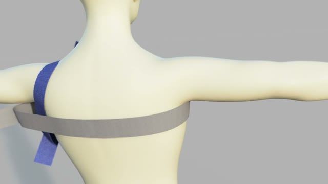 Still from the CAD animation: the tourniquet strap routes over the shoulder through a central pressure hub positioned over the axilla.